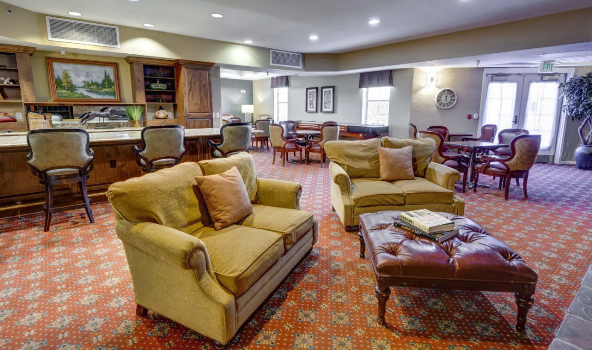 A cozy living room with comfortable seating and warm decor.
