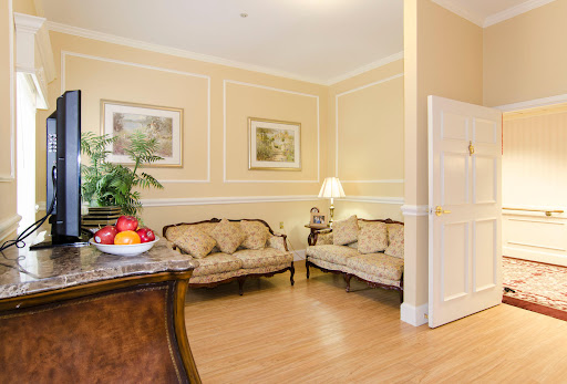 A cozy living room with elegant furnishings and warm decor.