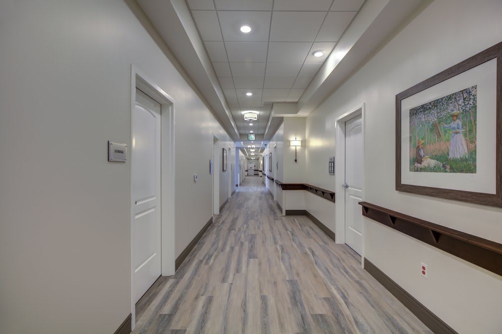 A modern and clean hallway in a healthcare facility.