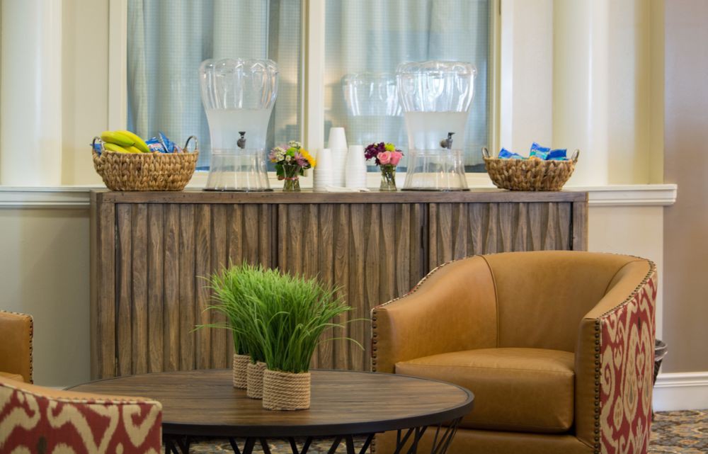 A cozy lobby area with comfortable seating and refreshments available.