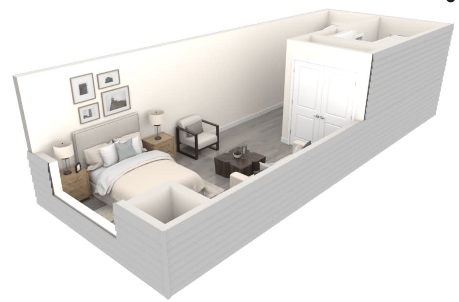 A minimalist bedroom layout showcasing simple and modern furniture in a compact space.