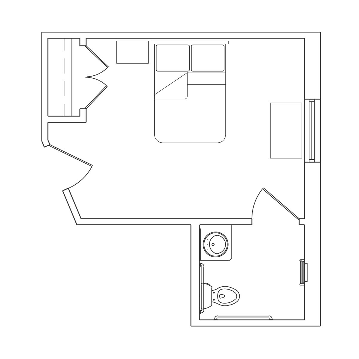 A floor plan of a small bedroom with an attached bathroom.