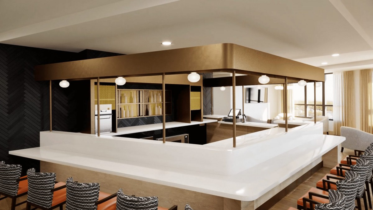 Modern kitchen with open design and stylish lighting.