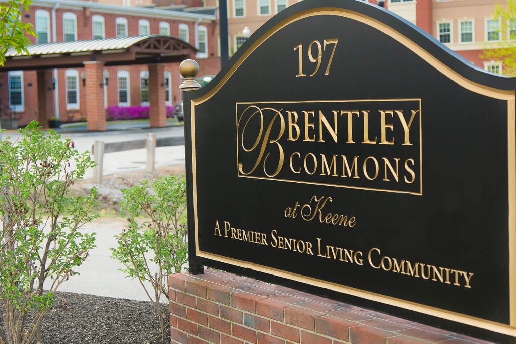 Sign for Bentley Commons, a premier senior living community.
