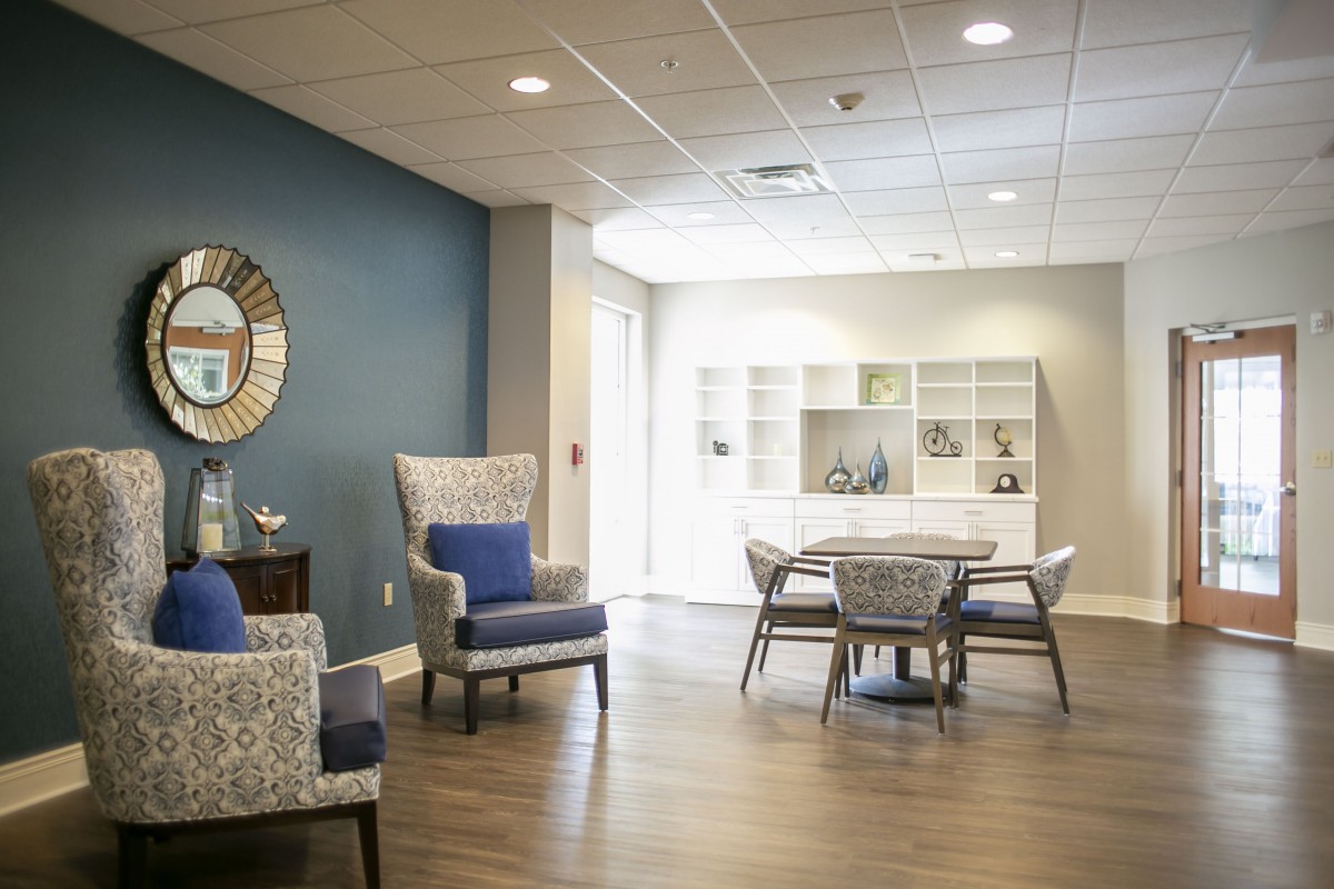 A modern living room with comfortable seating and stylish decor.