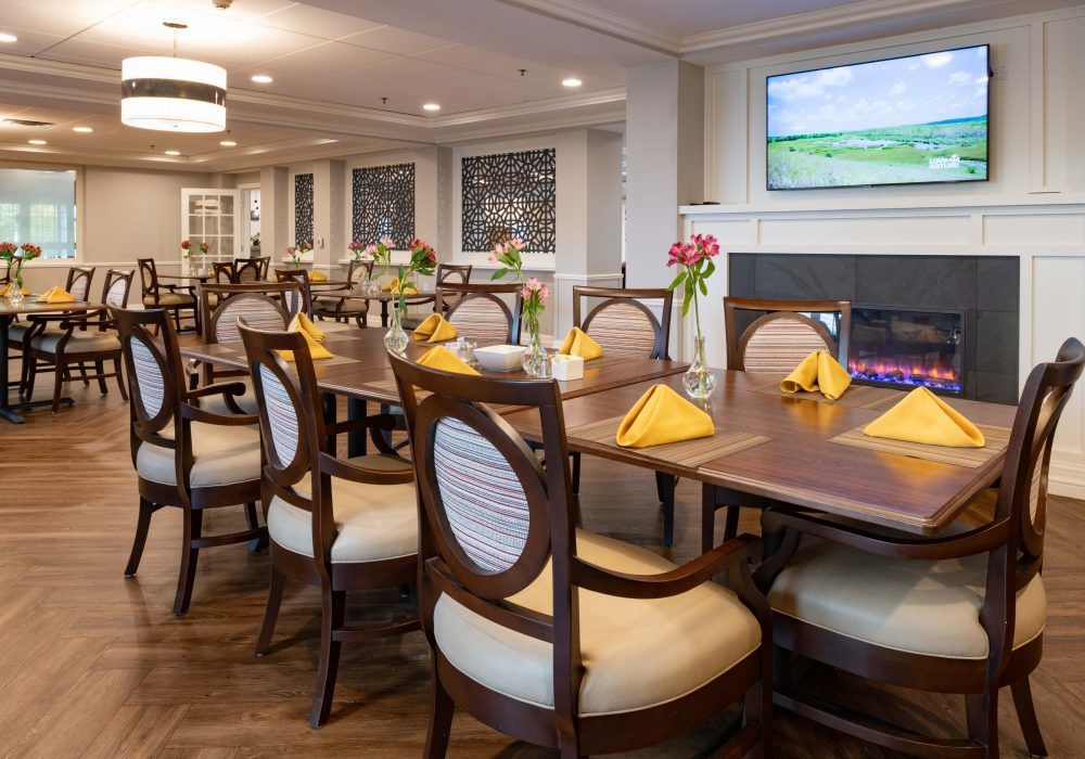 A beautifully arranged dining room with elegant furniture and vibrant decor.