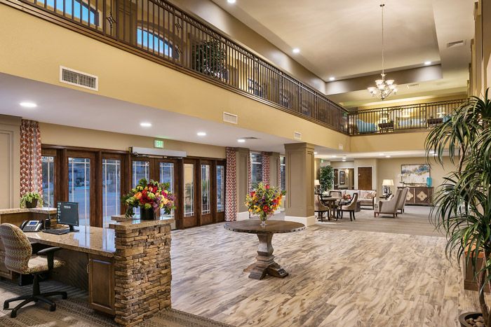 Spacious and elegantly designed lobby with stylish furniture and decor.