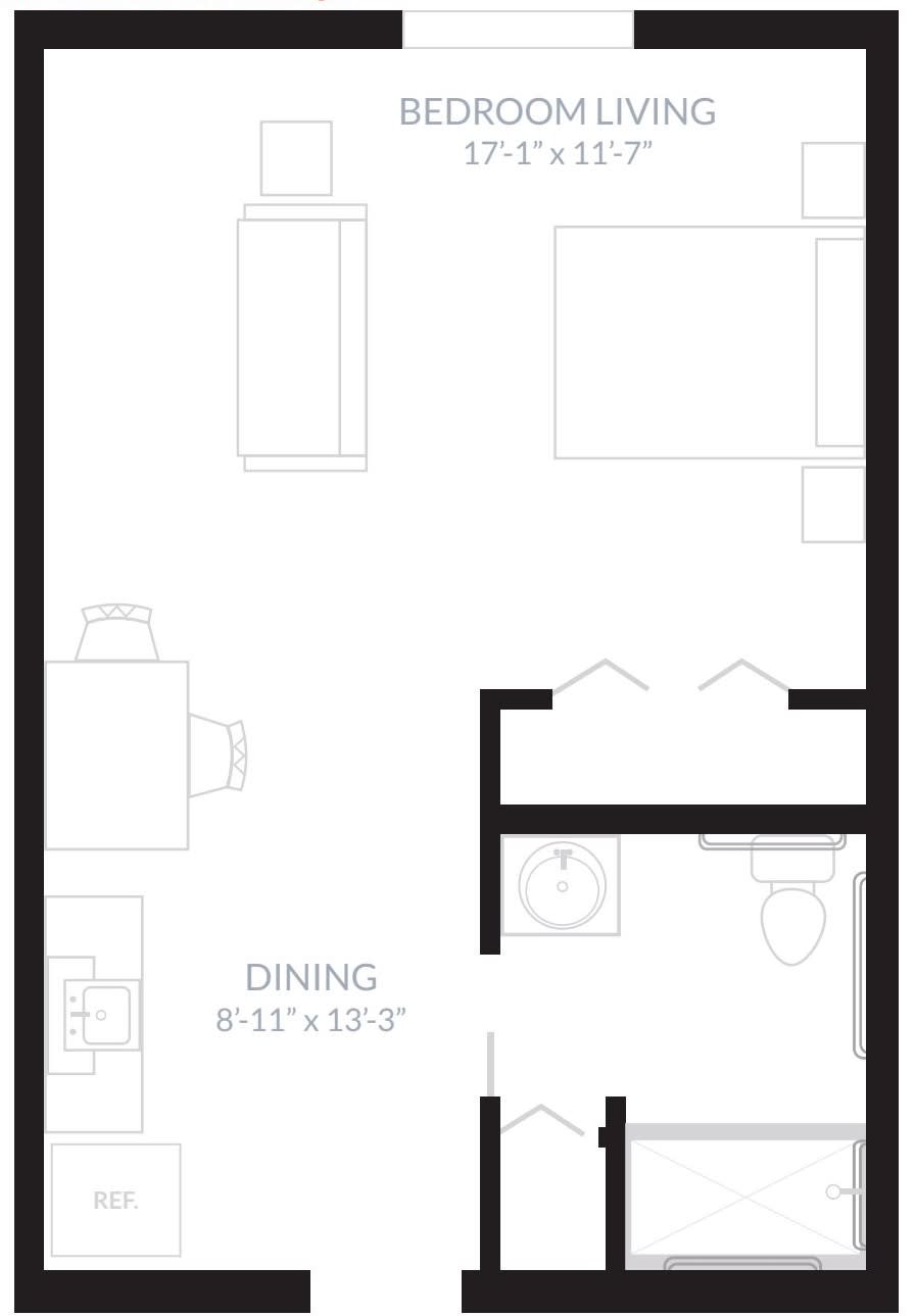 A basic floor plan showing the layout of an apartment with designated dining and living areas.