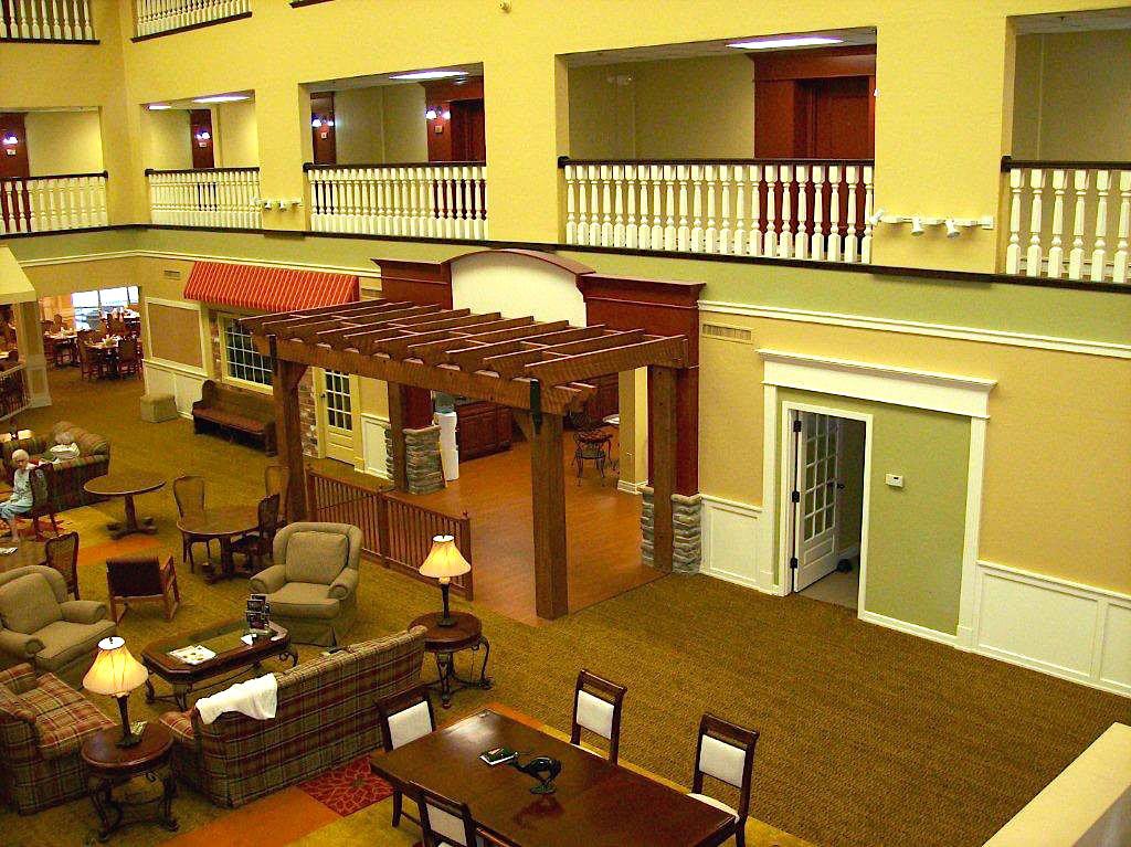 A spacious lobby with comfortable seating and decorative architecture.