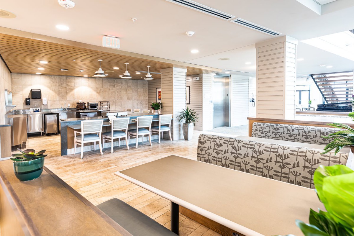 A modern and stylish restaurant interior with comfortable seating and elegant lighting.