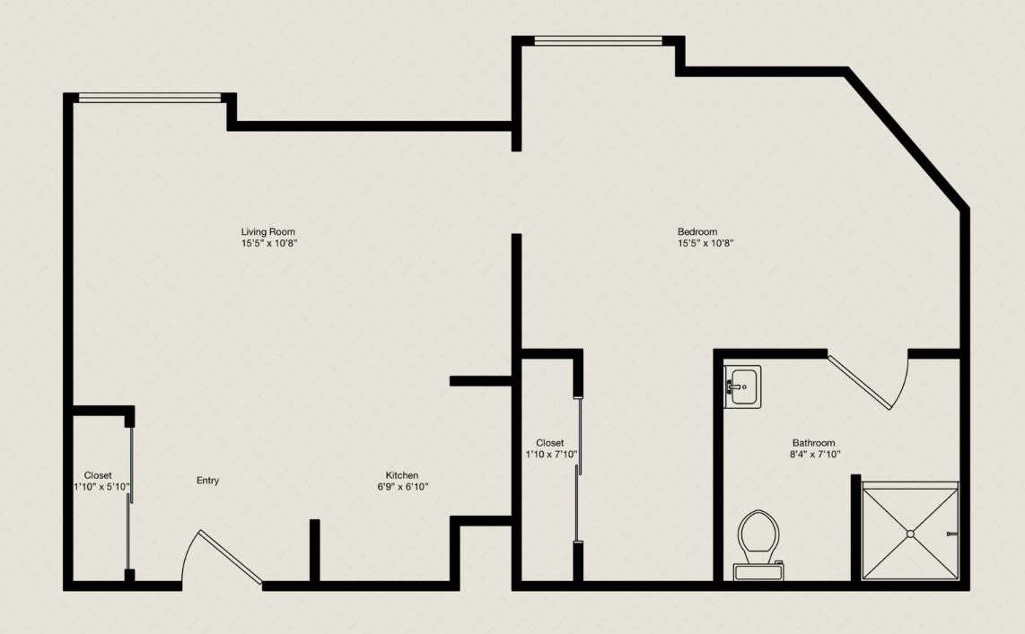A simple floor plan layout of an apartment with designated areas for rooms and a bathroom.
