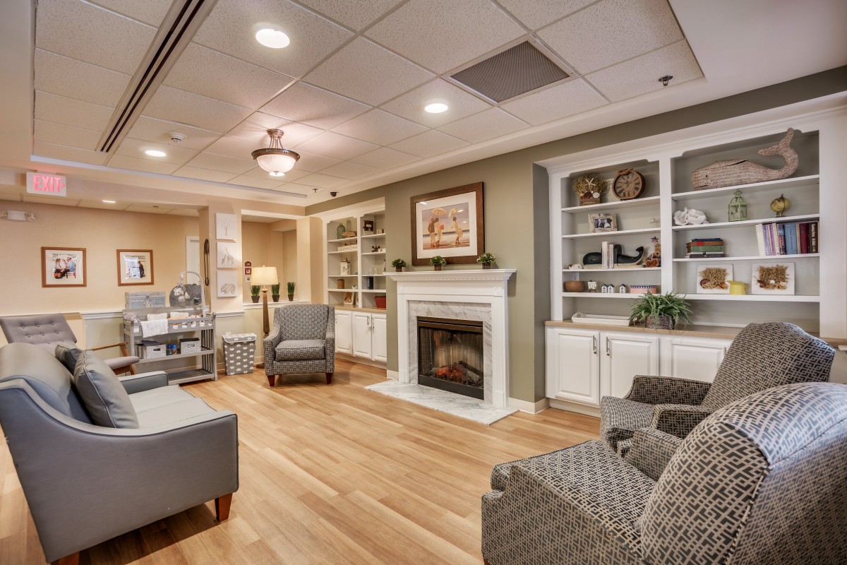 Cozy living room with a fireplace and comfortable seating.