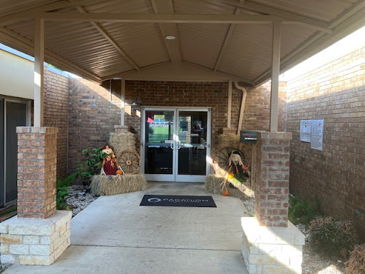 The welcoming entrance to a building, featuring decorative elements.