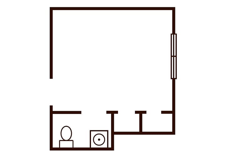 Simple floor plan of a bathroom layout showing the position of a toilet and sink.