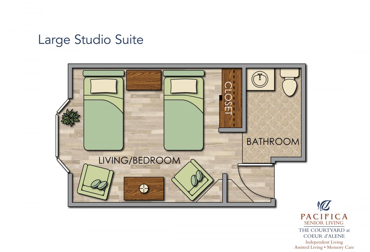 A floor plan of a vintage studio suite featuring a living/bedroom area, bathroom, and furniture arrangement.