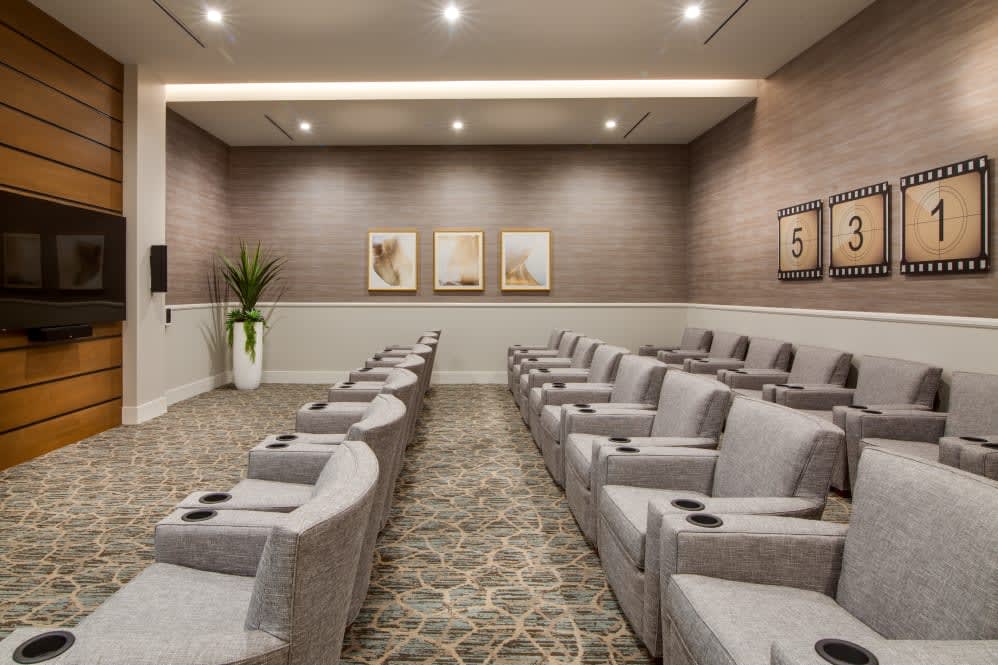A modern conference room with luxury seating arrangements and elegant interior design.