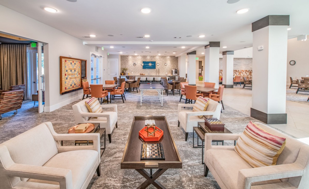 A spacious and elegantly decorated lobby with comfortable seating and modern furnishings.