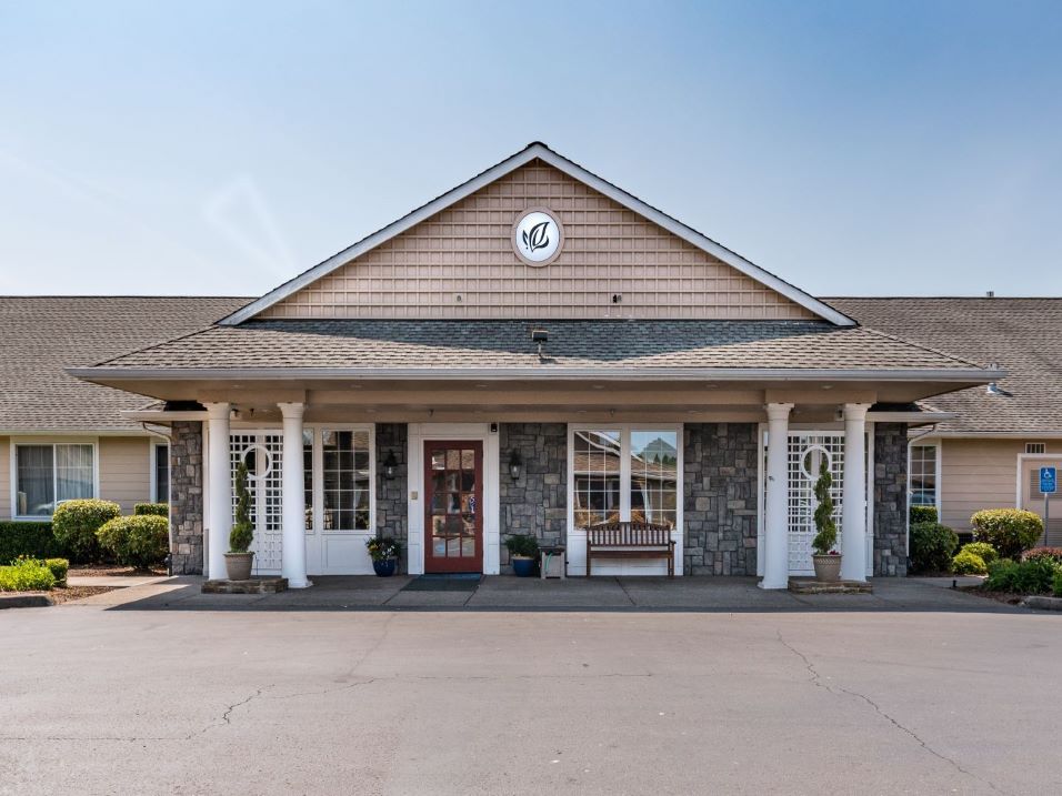 A commercial building with a welcoming entrance and traditional architectural style.