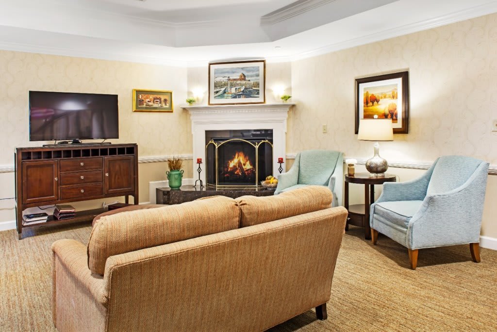 Cozy living room with a fireplace and comfortable seating.