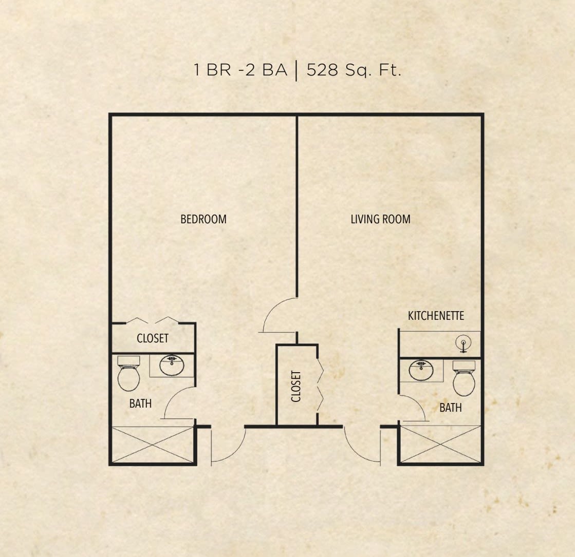 A floor plan layout of an apartment unit with two bedrooms and bathrooms.
