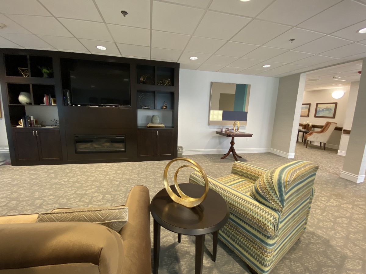A modern living room with comfortable seating and stylish decor.