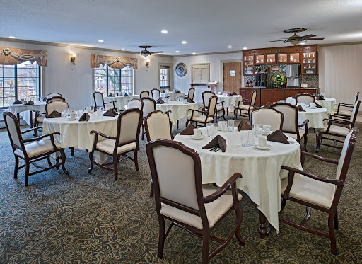 A spacious and elegantly arranged dining area ready for guests.
