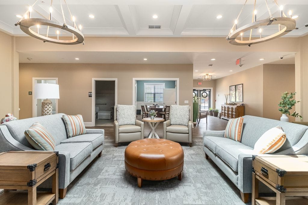 A modern living room with comfortable seating and stylish decor.