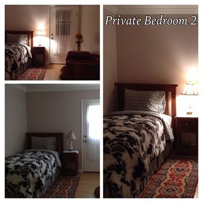 Cozy private bedroom with a single bed and warm lighting.