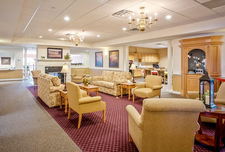 A cozy lounge area with comfortable seating and elegant lighting.