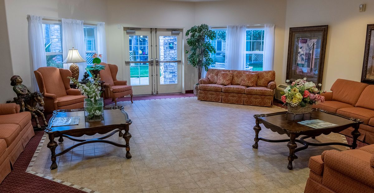 A cozy living room with comfortable seating and natural light.