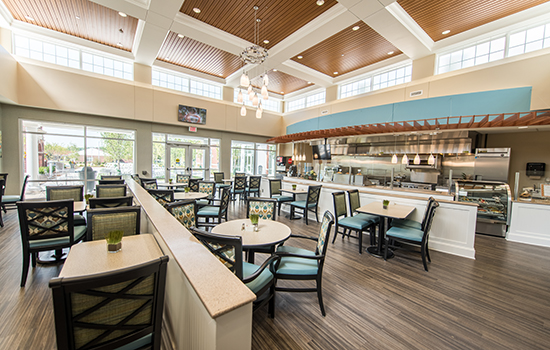 Modern restaurant interior with elegant seating and lighting.