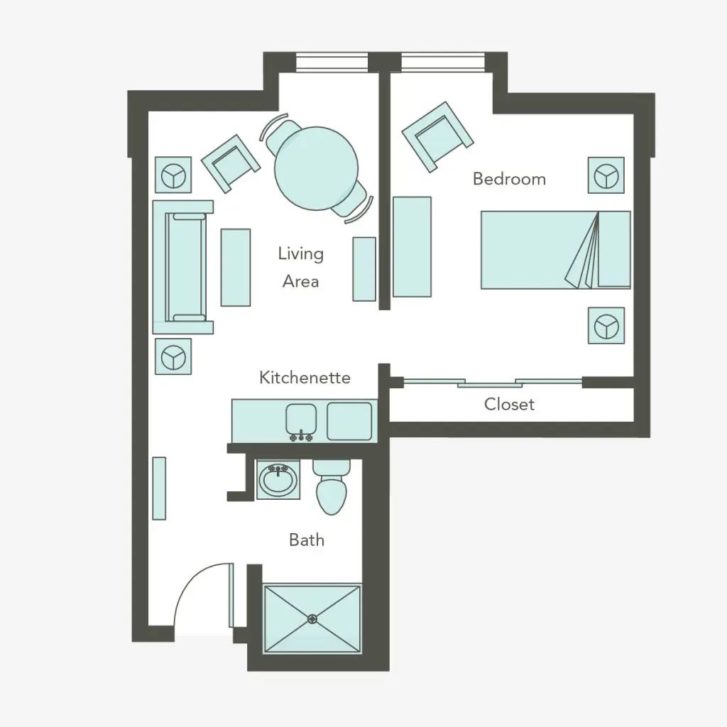 A simple floor plan of a one-bedroom apartment featuring a living area, kitchenette, bathroom, and bedroom.