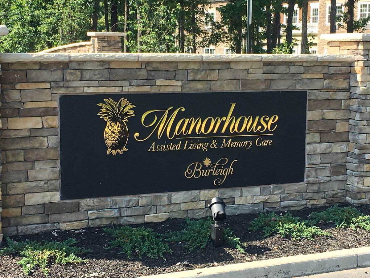 Entrance sign for Manorhouse Assisted Living & Memory Care.