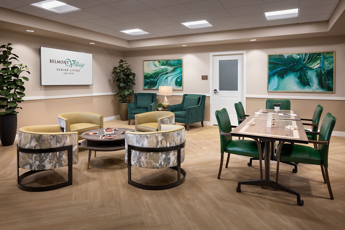 A modern lounge with comfortable seating and stylish artwork.