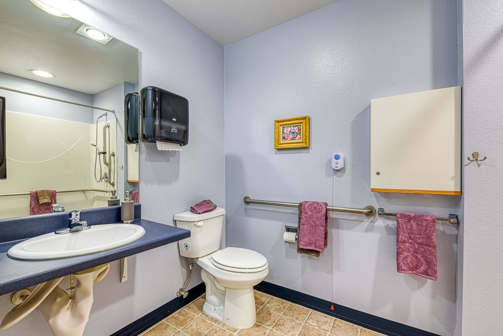 A clean and accessible bathroom equipped with essential amenities.