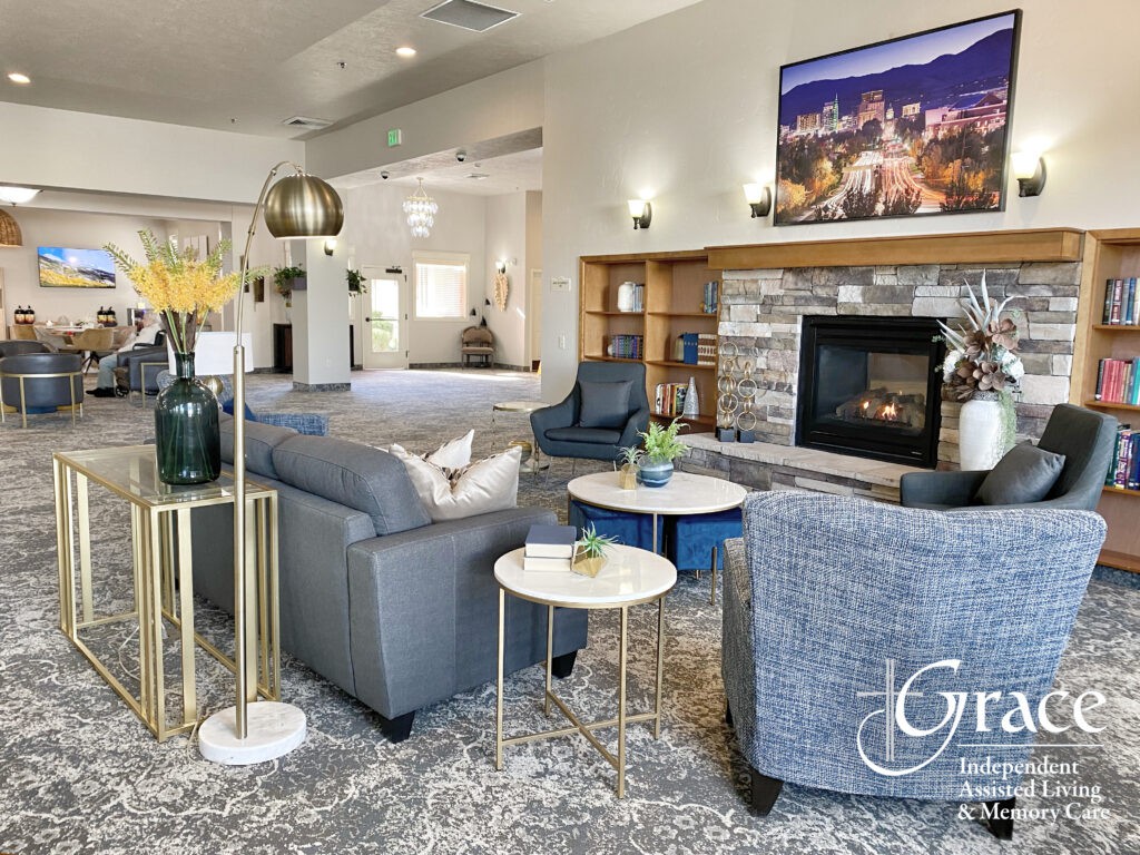 A modern living room featuring a cozy fireplace, stylish furniture, and elegant decor.