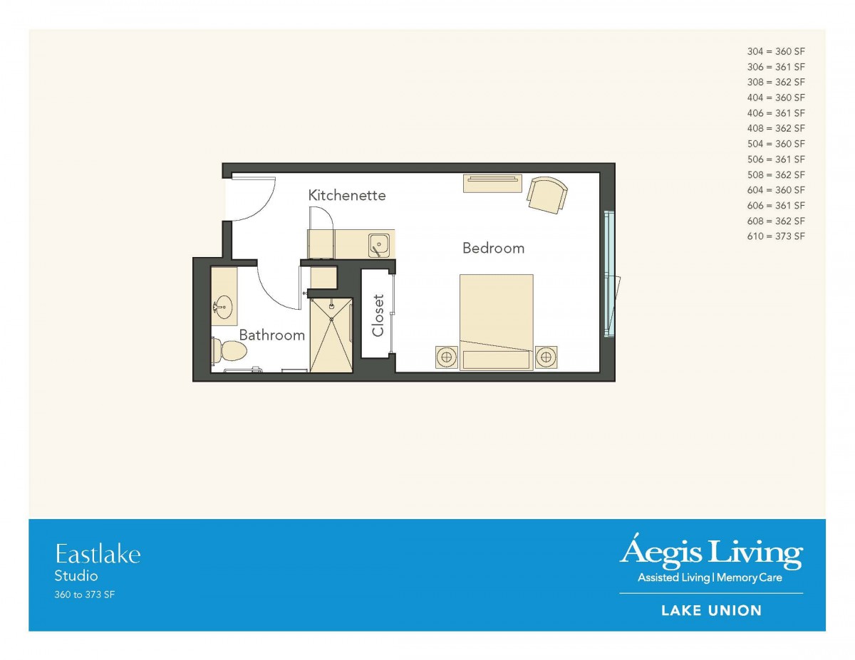 Studio apartment floor plan with kitchen, bathroom, and bedroom.
