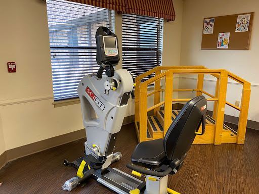 A seated exercise bike designed for rehabilitation and physical therapy.