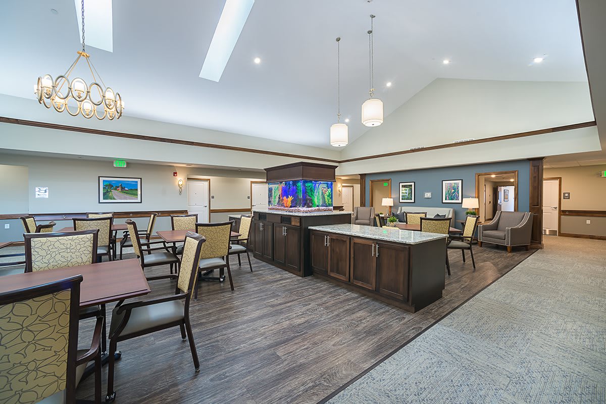 A modern dining area with comfortable seating and stylish lighting.