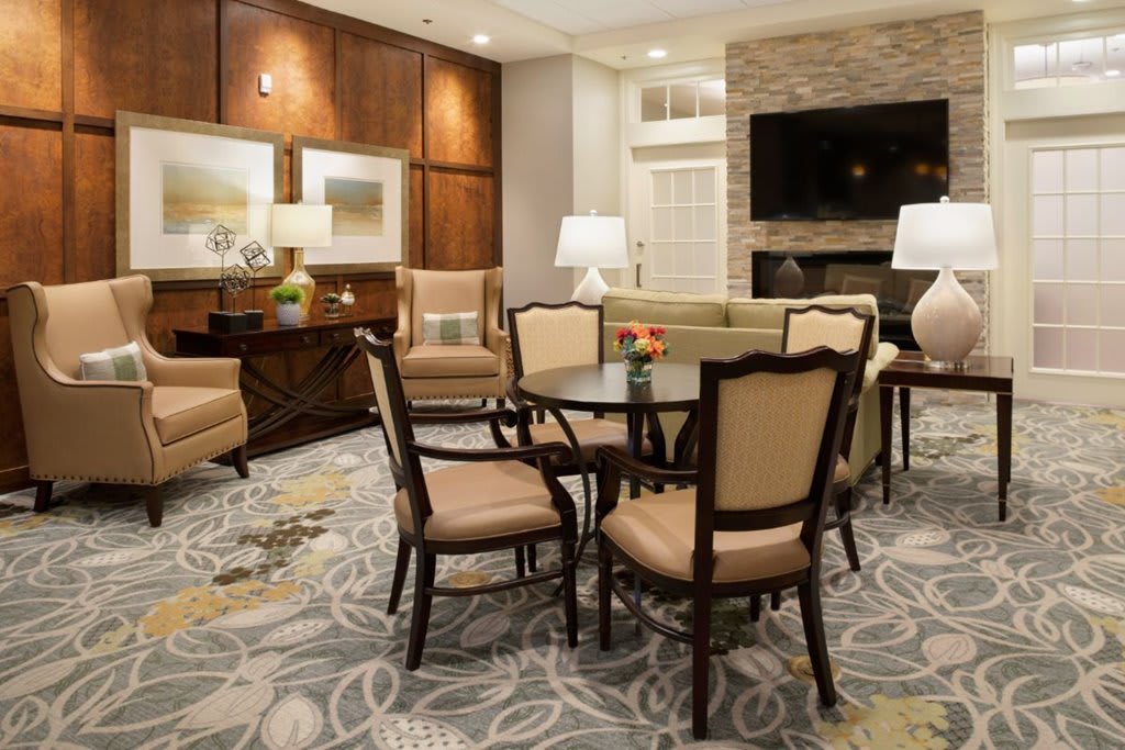 A cozy living room with elegant furniture and a warm ambiance.