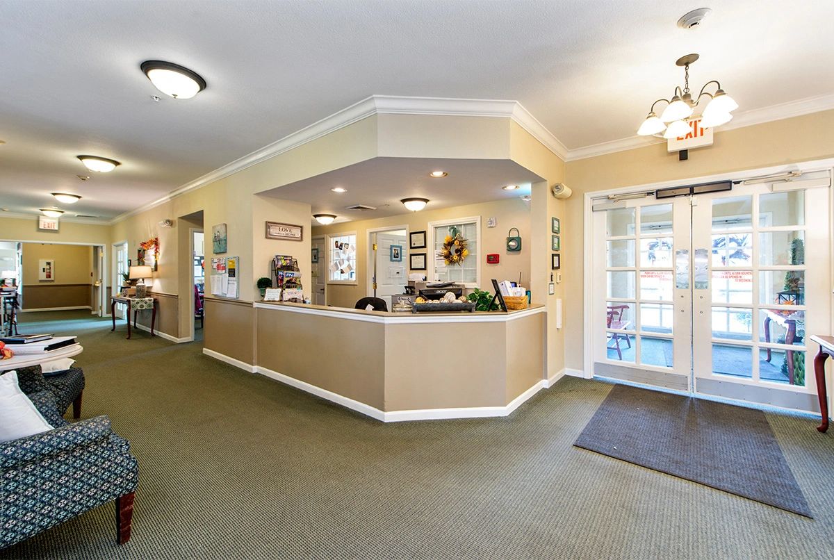 A welcoming reception area with a central desk and comfortable surroundings.