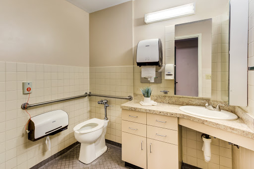 A clean and accessible bathroom with essential amenities.