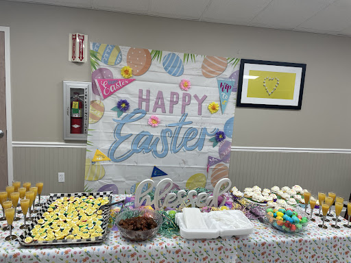 A cheerful Easter celebration setup with vibrant decorations and festive treats.