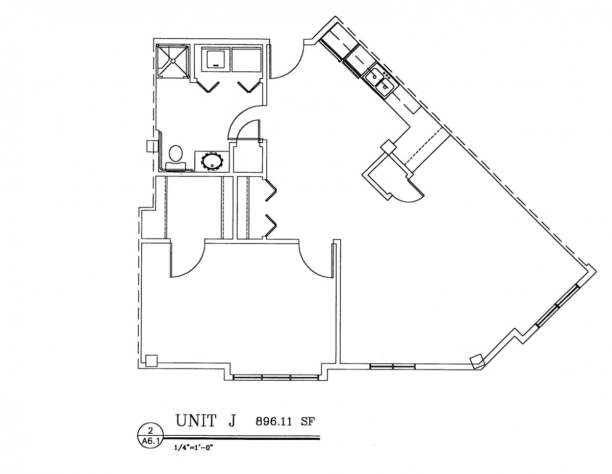 Architectural floor plan of Unit J showing the layout and dimensions.