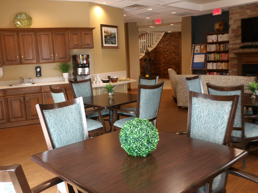A spacious and inviting lobby area featuring modern furniture and a cozy atmosphere.