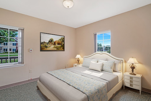 A cozy and inviting bedroom featuring soft colors and a serene atmosphere.