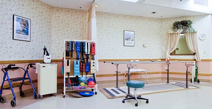 A therapy room equipped with exercise and rehabilitation tools.