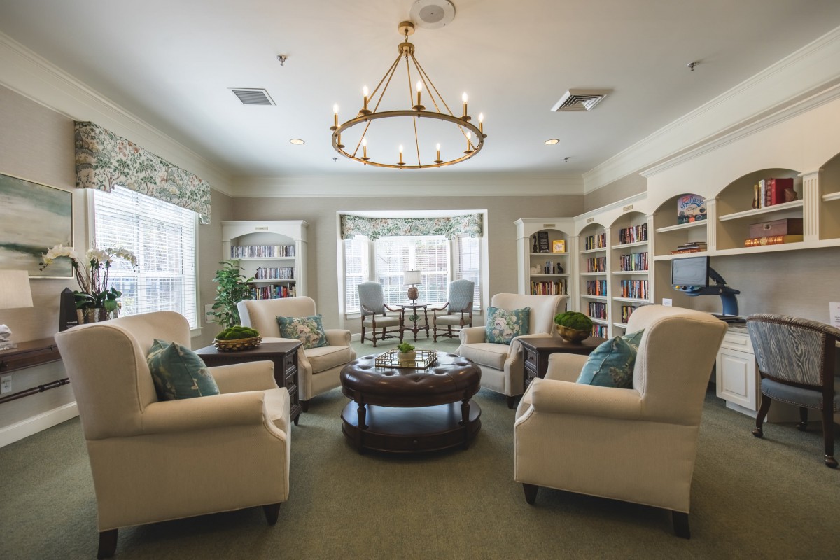 A cozy living room with comfortable seating and elegant decor.