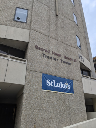 St. Luke's Sacred Heart Hospital Tower, showcasing the entrance and signage of the medical facility.