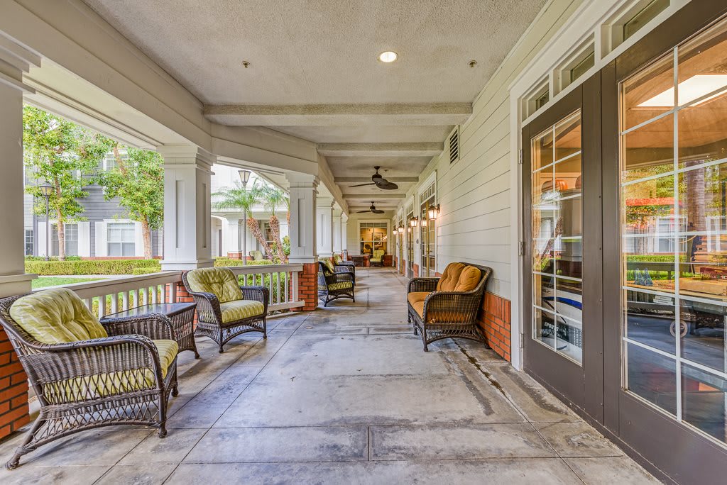 A spacious porch with comfortable seating and a relaxing atmosphere.
